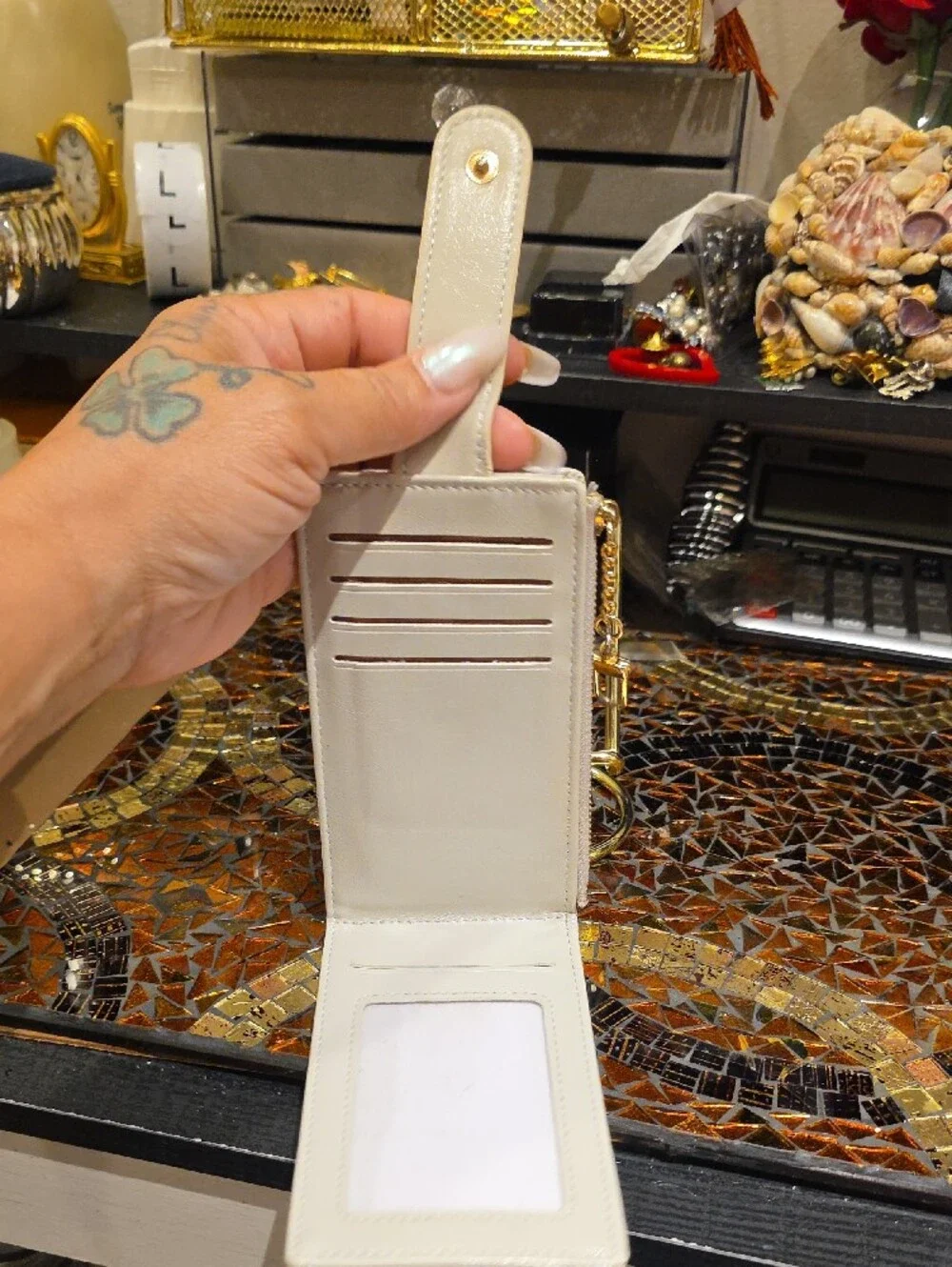 Elegant Cream Phone Wallet Case with Card Slots and Chain Strap